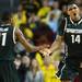 Michigan State junior Keith Appling slaps hands with freshman Gary Harris as he celebrates a play in the second half against Michigan State at Crisler Center on Sunday, March 3, 2013. Melanie Maxwell I AnnArbor.com